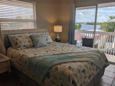 Beach to Bay! Heated Pool and Dock on the Bay! Walk to the Beach and Restaurants