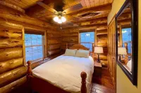 Custom log cabin tucked away in private forest
