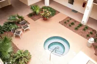 PRIME Location & Private Beach Access! Palm Tree Paradise