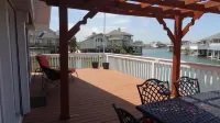 ENJOY FISHING, SWIMMING OR JUST RELAXING AT THIS JAMAICA BEACH CANAL PROPERTY