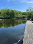 Spacious Summer Escape: Private Backyard, Dock & Fire Pit, Channel Waterfront