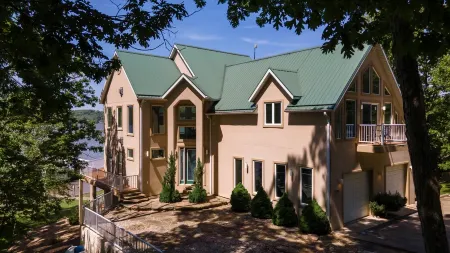 A Large Unique Panoramic Retreat at the Quiet 55-mile mark of Lake of the Ozarks