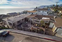 A Few Steps to the Beach! Ocean Views, Patio with Fire Pit and Garage Parking!