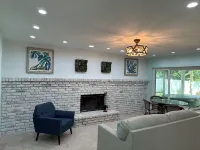 Coastal 3-bedroom cottage 4 blocks from the Beach w/ Mini Golf in Vero Beach Hotels in Wabasso Beach