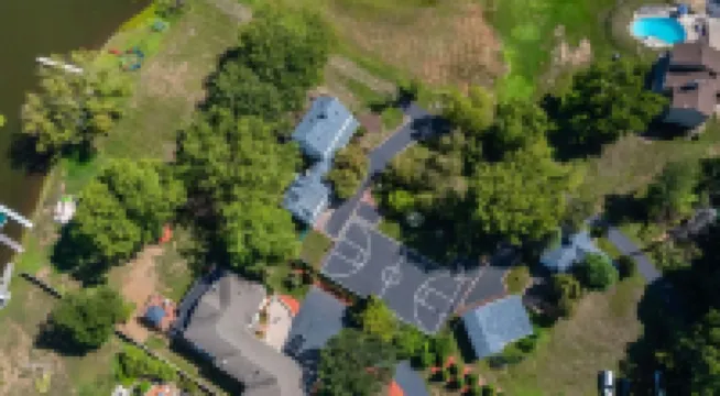 Lake Front 2.20 acre estate  Private boat launch with pier