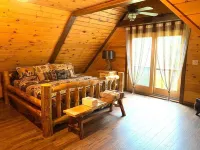 secluded log home, minutes from all star village in Oneonta