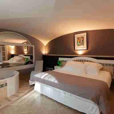 Hôtel Spa Restaurant l'Ostella Rooms