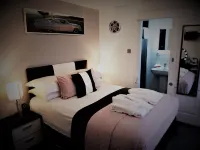 Cadillac Kustomz Guest House Hoteles en Rothesay