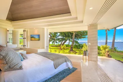 Ocean Views and Lush Gardens - Luxurious Beachfront Haven