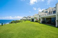 Lovely Pu'u Poa home overlooking the Pacific Ocean w/shared pool, W/D, & lanai