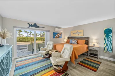 NEW! Colorful studio STEPS from the Beach with Pool and Upgraded Kitchen!