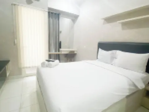 Elegant and Homey Studio at Amartha View Apartment