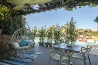 Geco di Giada Exclusive Art Suites Hôtels à : Marinella