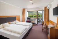 Hotel Straubs Schöne Aussicht Отели в г. Эрленбах-на-Майне