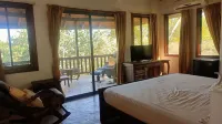 Hotel Nature Lodge Finca Los Caballos فنادق في تامبور