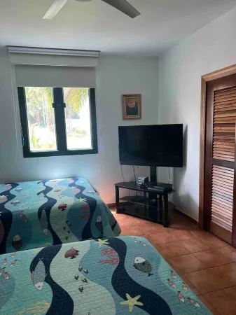 Lovely 2 Bed room villa in luxury resort with Beach & Pool access *golf cart Отели в г. Мамейес II