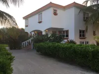 Beautiful 5 bedroom beachfront villa with private pool just 2.5 miles from town Hotels in 