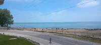 Yes that's the Lake view !  Private beach - Rooftop patio - Large balcony