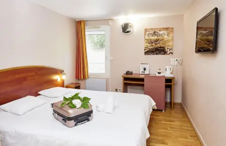 Logis Prim'Hôtel Bagatelle Отели в г. Шампийон