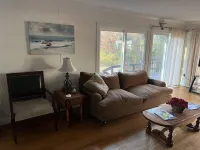 Cozy Cottage with access to and partially obstructed views of the bay.