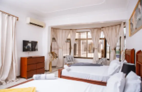 Spacious Apartment in Dar es Salaam with City, Ocean, and Pool Views