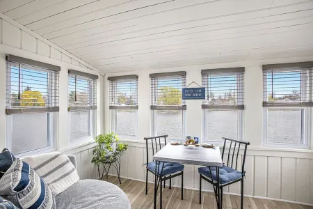 Beautiful boathouse with an all season hot tub, paddle boat and kayaks!