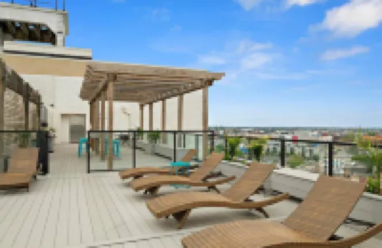 Rooftop Pool and Chic Amenities - Stylish Urban Sanctuary