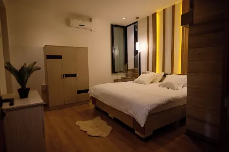 Modern and secure 2-bedroom apartment in Antananarivo with AC, WiFi, jacuzzi Отели рядом с достопримечательностью «Ботанический и зоологический сад «Цимбазаза»»