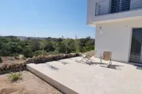 Seafront Juniper apartment with large veranda, 20m from the crystal clear sea.