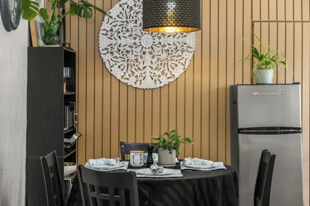 Downtown Den | Steps Away from Worlds Largest Dino