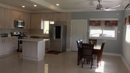 Exotic beach front property with Olympic size pool and a gym !