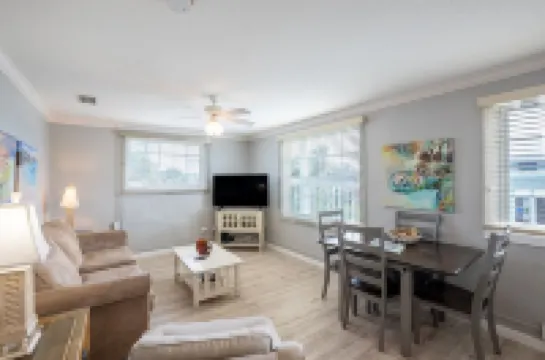 Salty Kisses Seaside Condo just steps to the beach and fishing pier