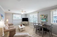 Salty Kisses Seaside Condo just steps to the beach and fishing pier