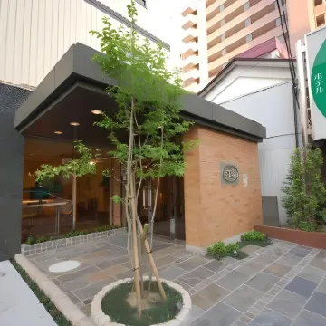 Hotel Green Arbor Hotel dekat Stasiun Kuzooka