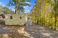 Accessible 1BR Cottage with Firepit Near Trails - balcony