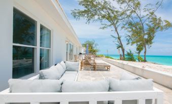 Beachfront White Palm Villa - Tar Bay