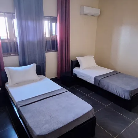 Deluxe Twin Beds Bedroom in Lome Togo