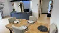 New 80 m² apartment with garden, quiet, walking distance to port, stadiums and shops