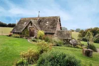 The Coach House is a retreat from the outside world. Hotel di 