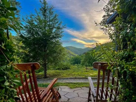 Whispering Falls Cabin - hot tub, views, 15 acres, minutes from Main St.