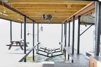 Lake House with pool + hot tub on Golf Course with boat dock