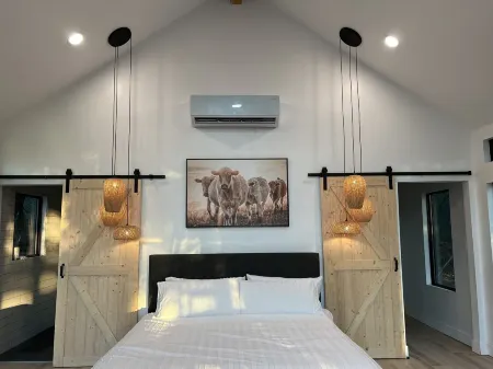 Modern stay on a relaxing ranch with friendly animals to pet and feed.