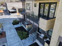 Downtown Modern 3-Bed Townhome with Bright, Upgraded Interiors & Books to read