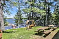 Nature's Edge: Lakefront Home - WiFi, Free Firewood, Generator, No Cleaning Fee!