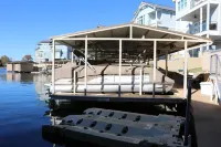 Shenanigans New Large  home steps from the water. Heated Pool hot tub boat slip