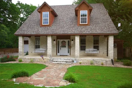 Tranquil Texoma Lake House w/ private lake on .5 acres & steps from Lake Texoma