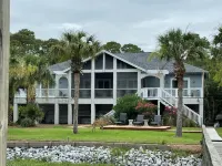 Spectacular 5-Star on the creek home, 6 cards and Golf Cart with full week stay