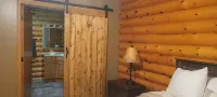 Log Cabin located minutes from Missouri River, airport, I-90,  and downtown.