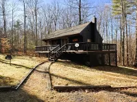 Camp Creaky Birch, cozy 2-bedroom cabin with privacy, firepit and deck.