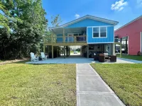 Cozy water front home with a swimming pool near beaches and Old Town BSL!